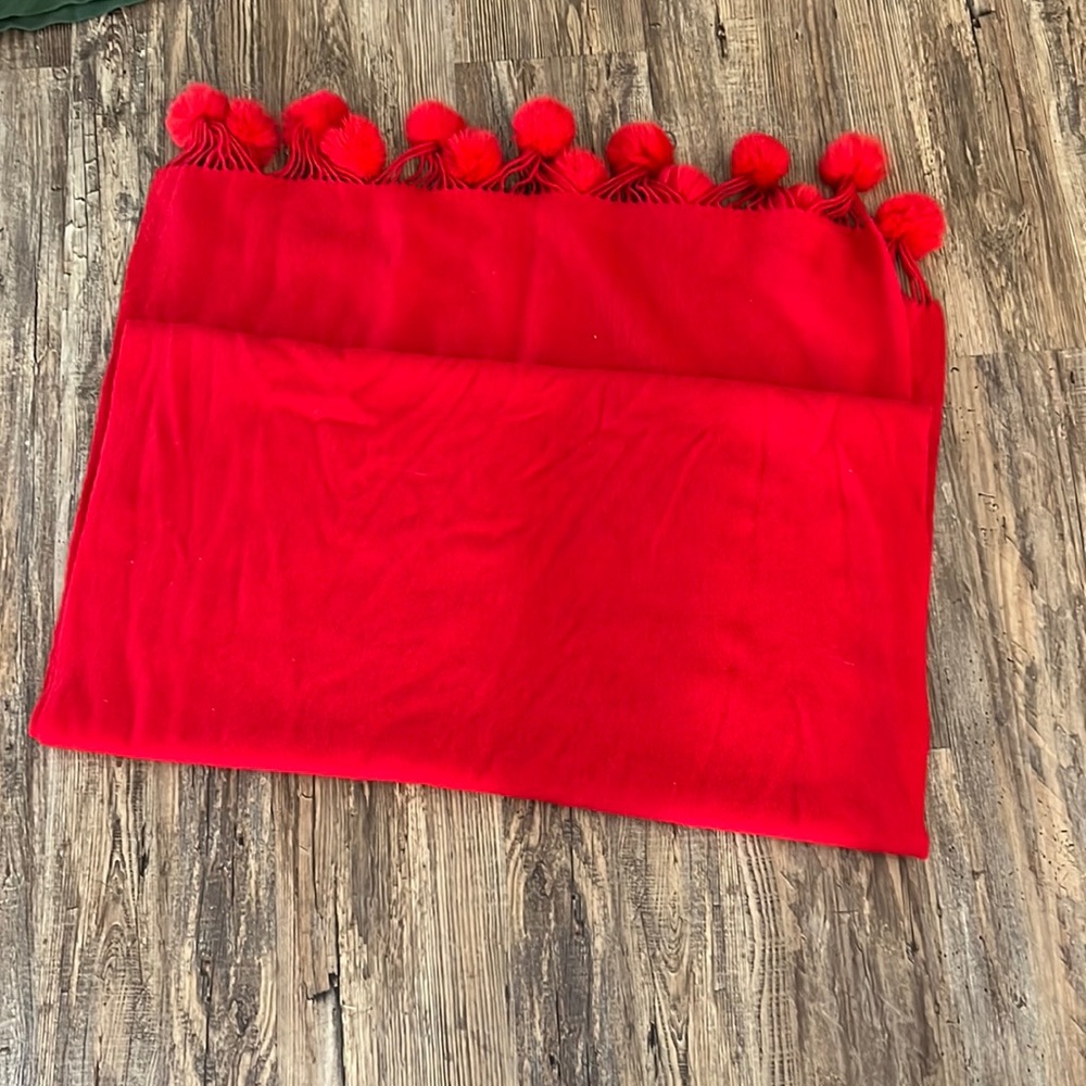 Anthropologie  Red pashmina with red soft poms poms